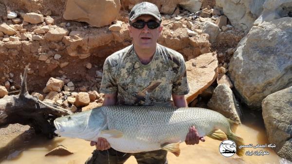 گزارش تصویری از برنامه ماهیگیری در سد کارون 3 - آرش امینی